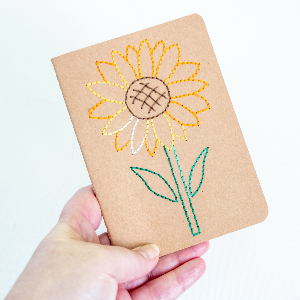 Created by LDBankey | Hand Stitched Sunflower Notebooks with decorative paper