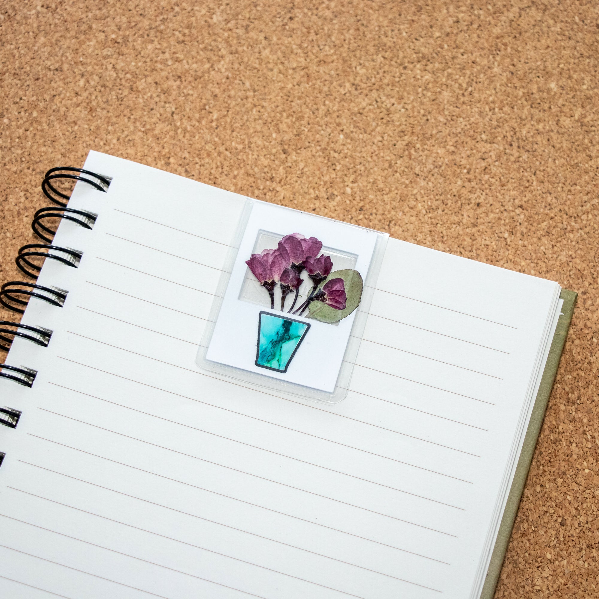 Purple Flowers in Blue Vase