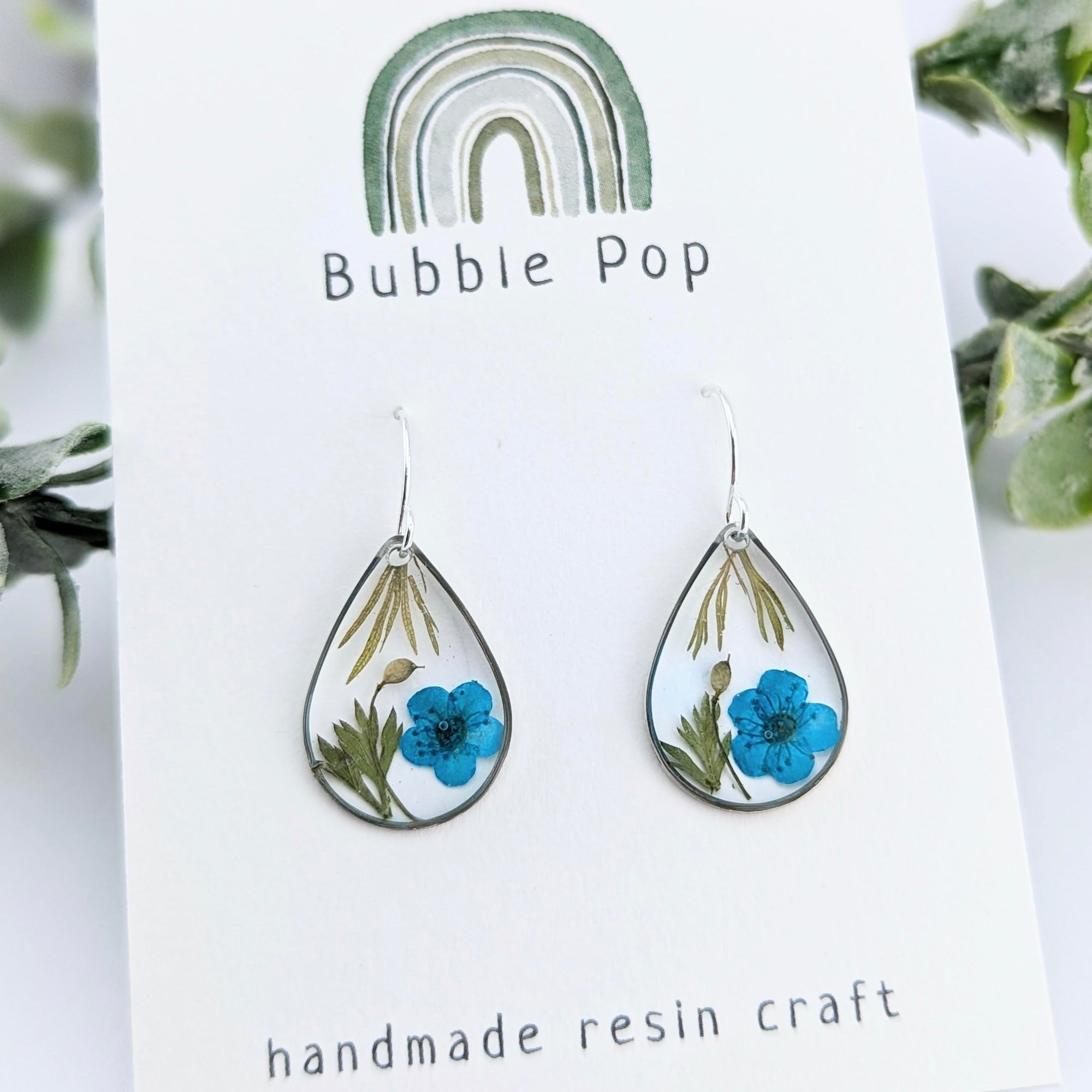 BubblePop | Handmade resin earrings with blue Spirea flowers