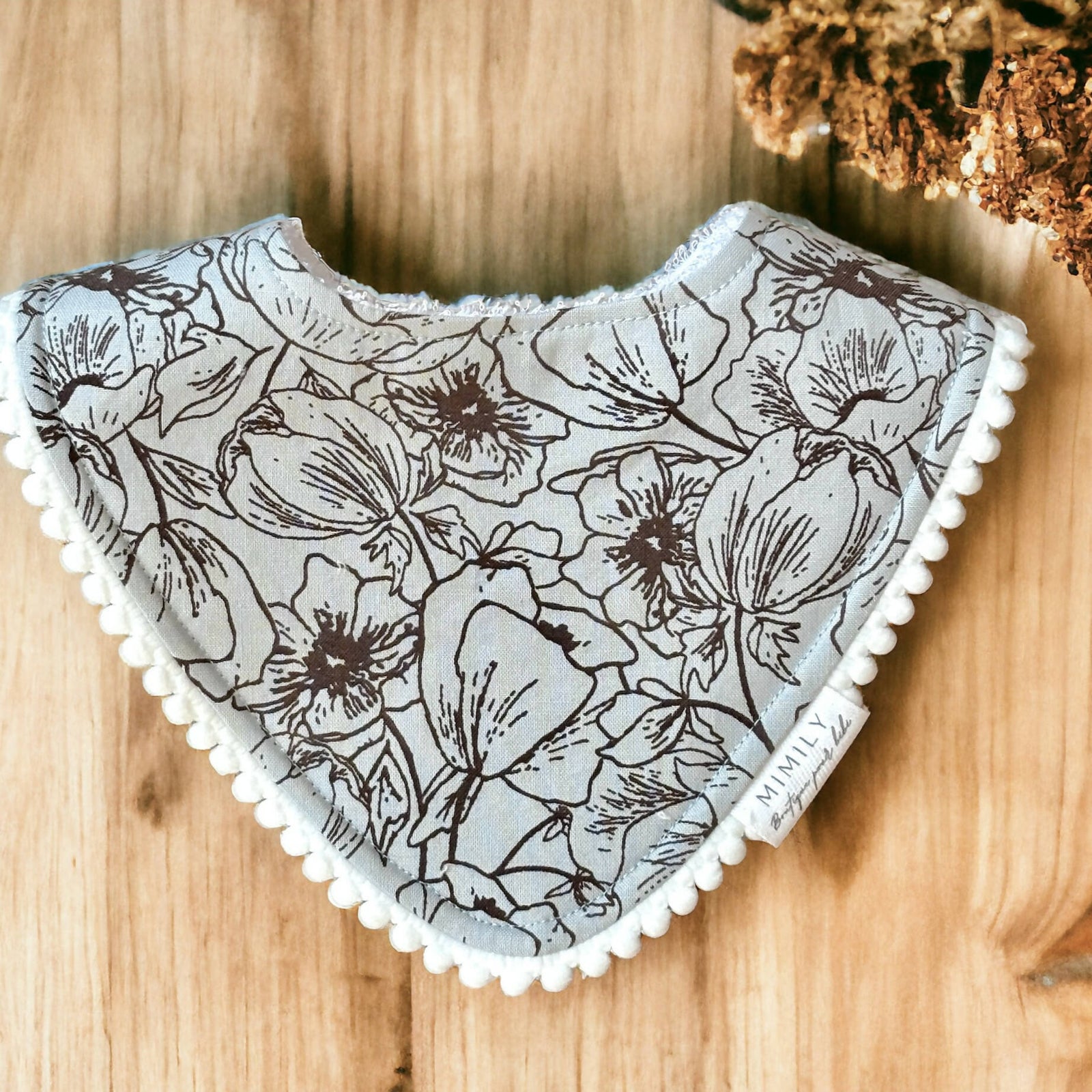 Mimily Boutique | Brown flower bib with pompoms